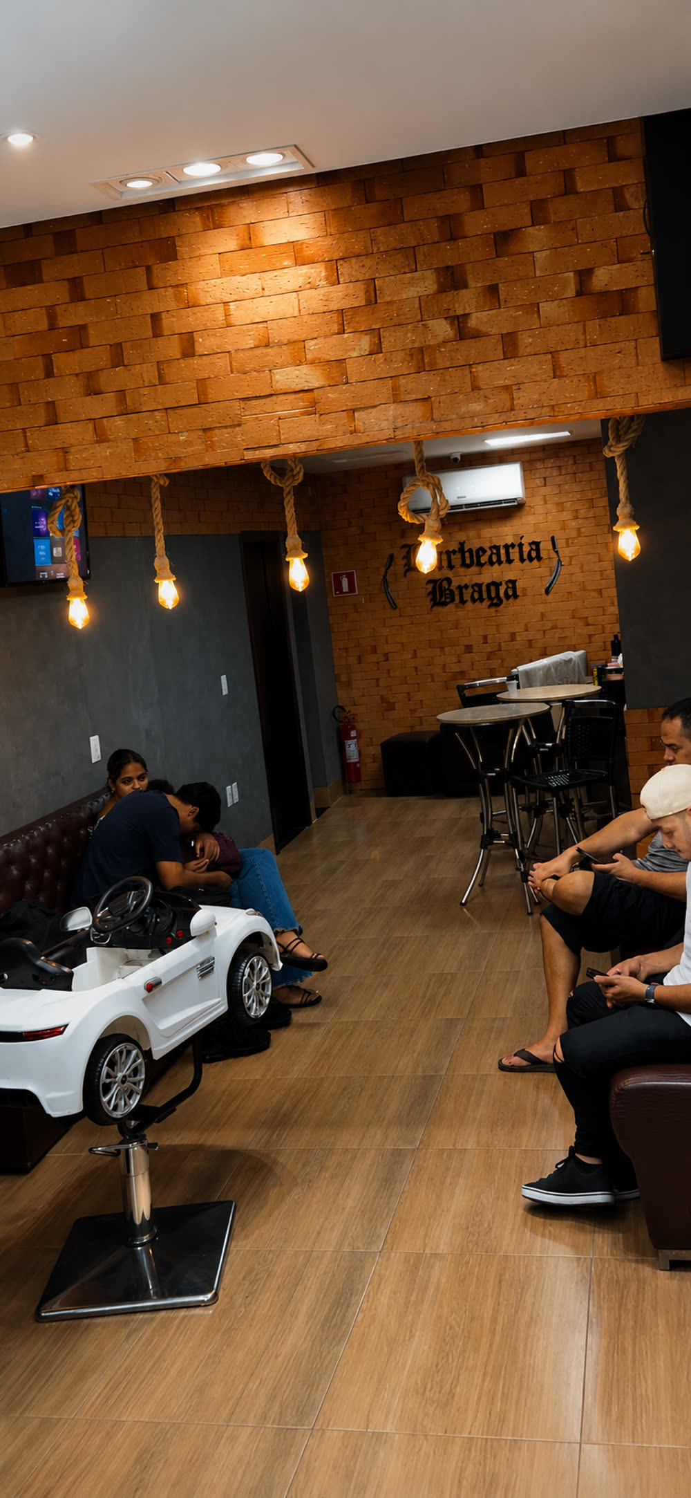 Ambiente e design da Barbearia Braga